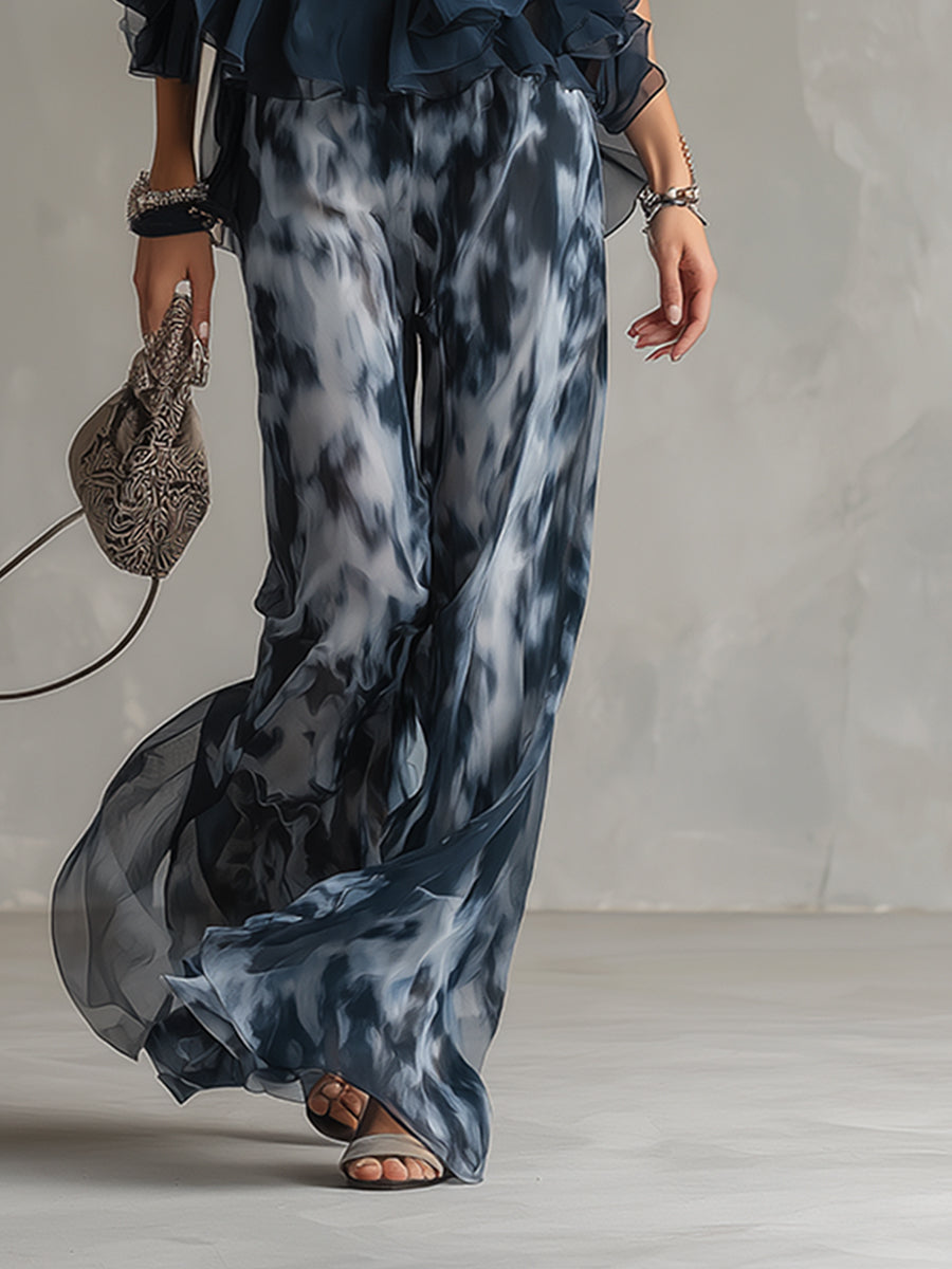 Ludovica - elegant with a high-neck top and wide printed trousers